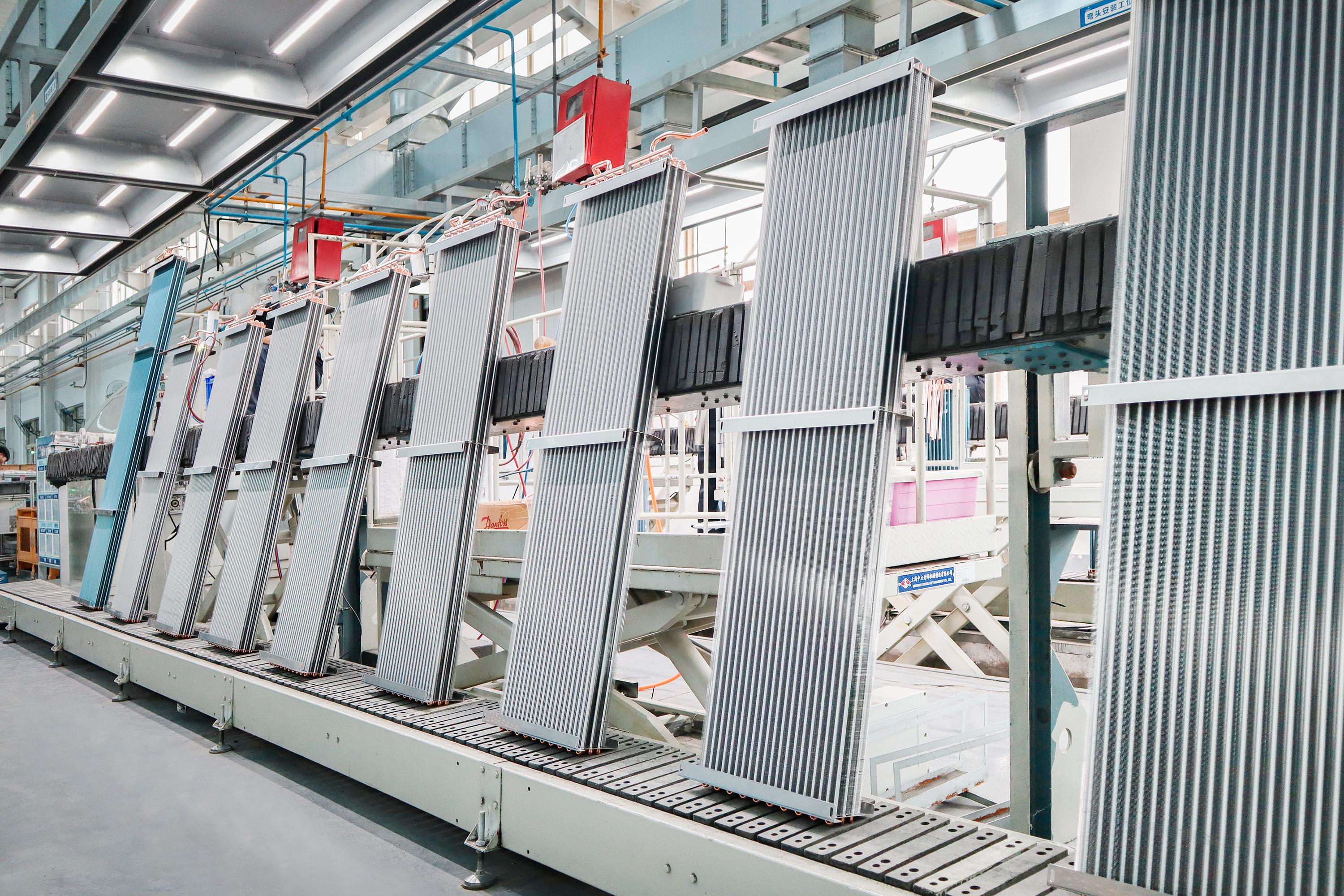What are the key processes in the production of bus air conditioning systems